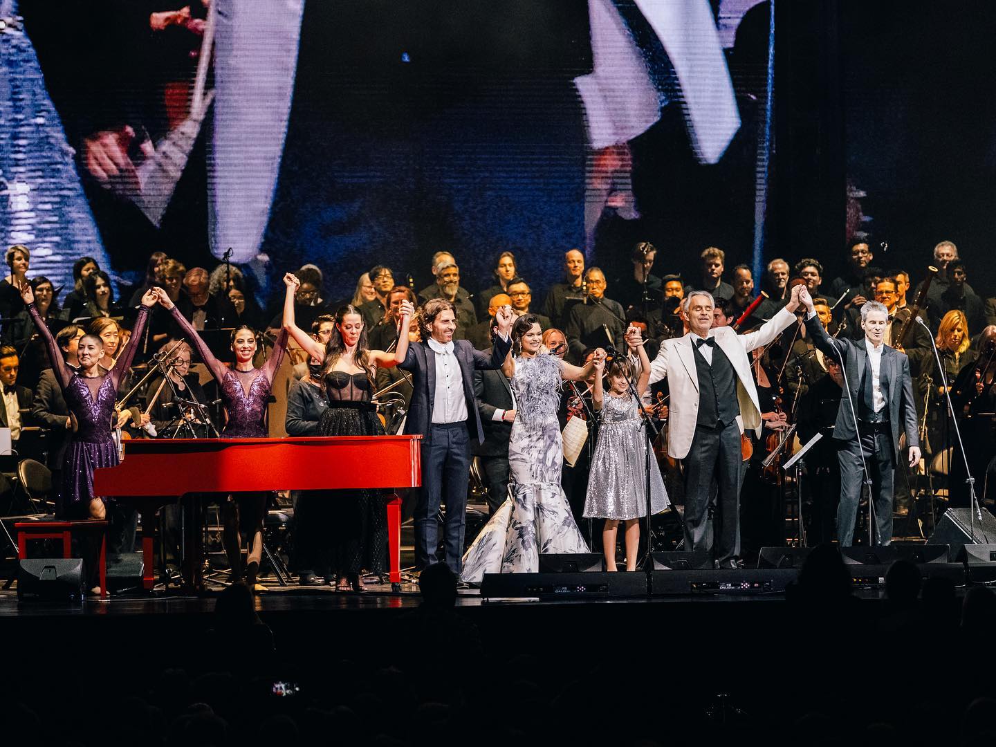 A group of people on a stage

AI-generated content may be incorrect.