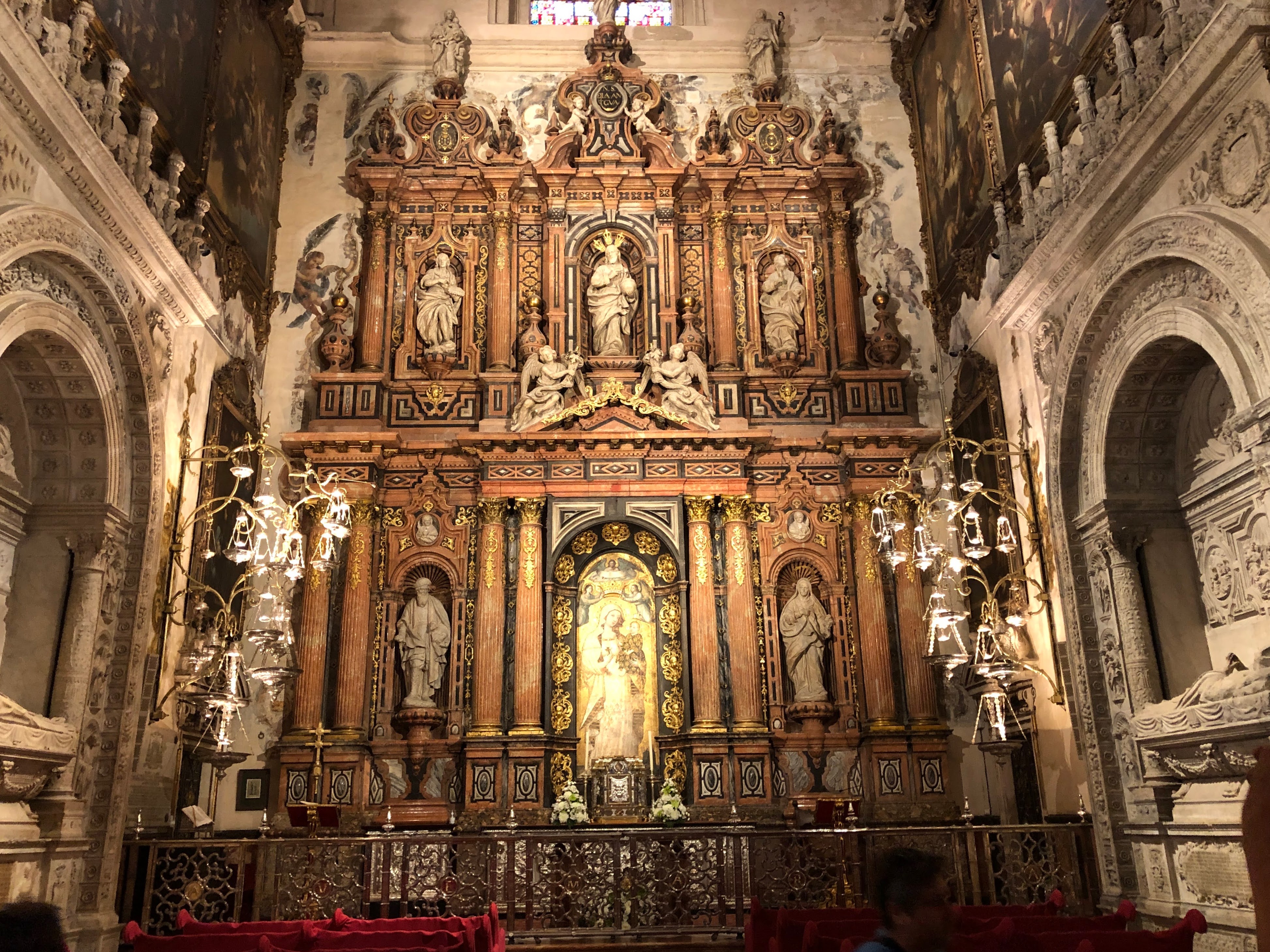 A large ornate church with statues

AI-generated content may be incorrect.