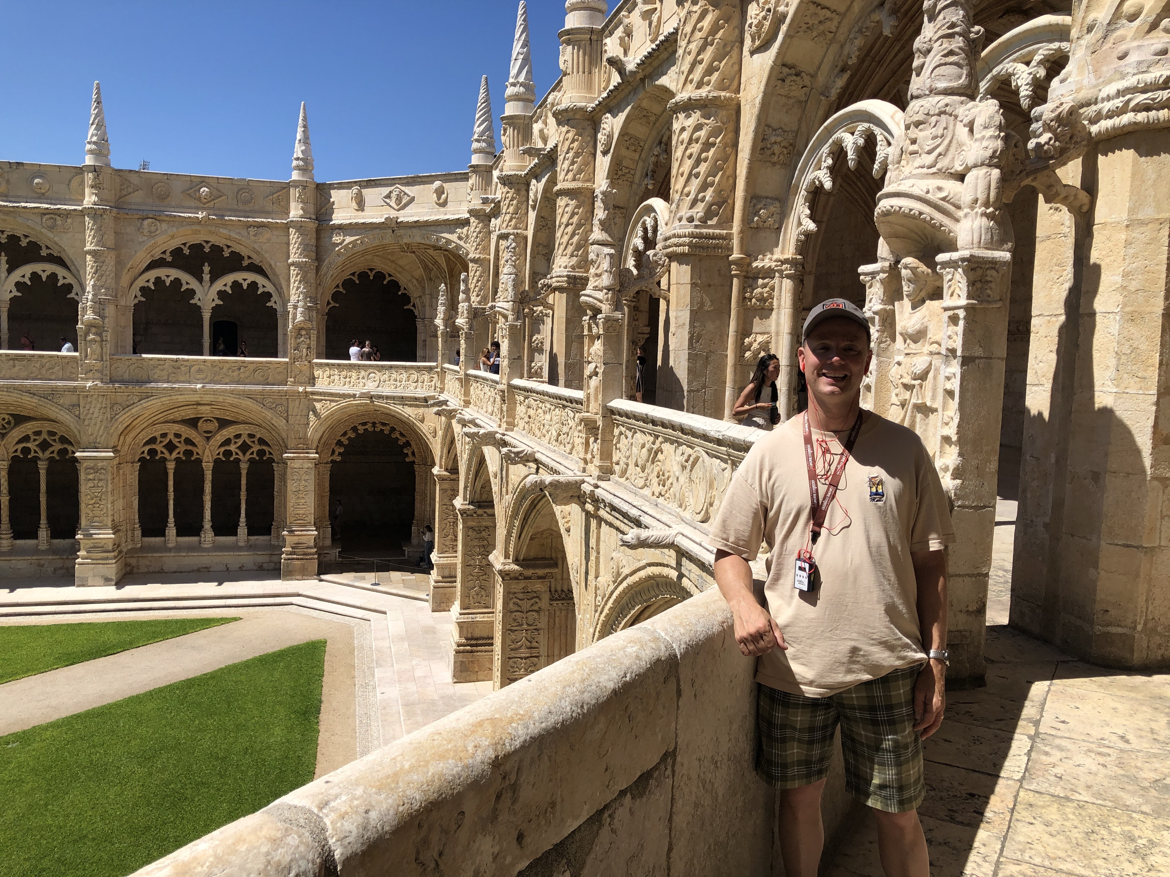 A person standing in front of a stone building

AI-generated content may be incorrect.