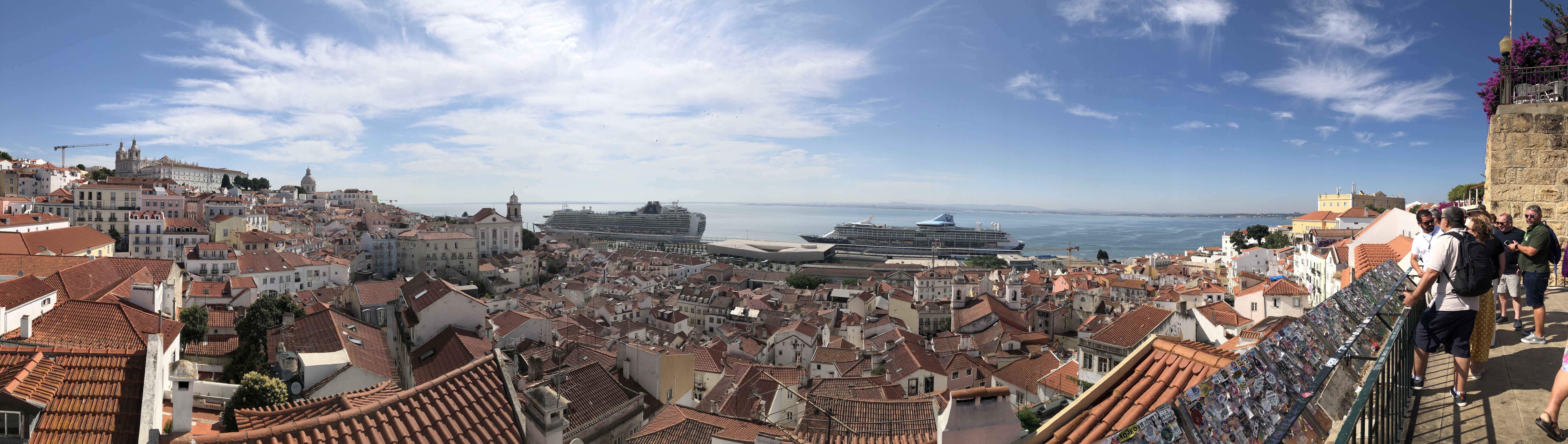 A city with a ship in the background

AI-generated content may be incorrect.