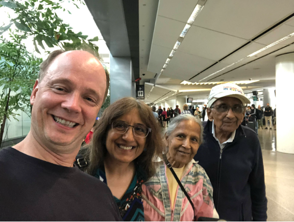 A group of people taking a selfie

AI-generated content may be incorrect.